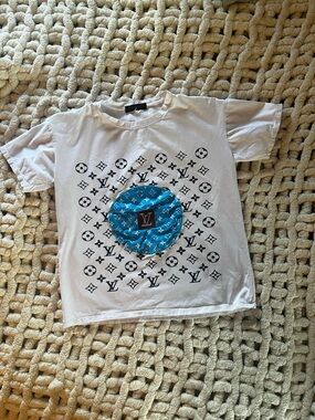 Women’s Louis Vuitton White Graphic Tee with Blue Logo Medallion
